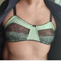 Emerald Comfort: Glossy Green and Black Lace Bralette for Men